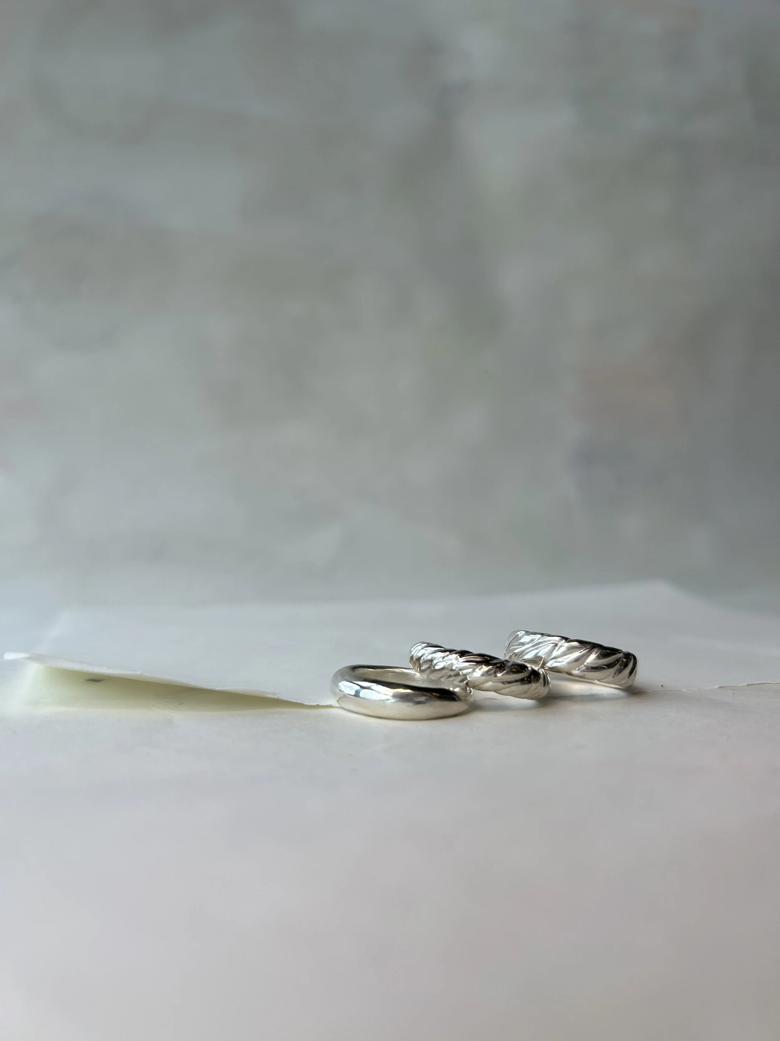 The Core - sterling silver ring with two other pieces from the First Collection