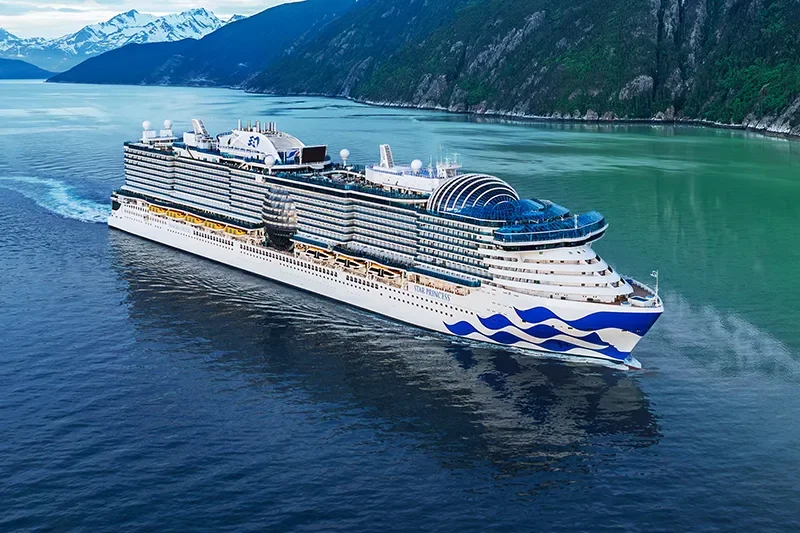 Princess Cruises ship sailing through Alaska waters offering luxury Alaska and Caribbean cruise vacations