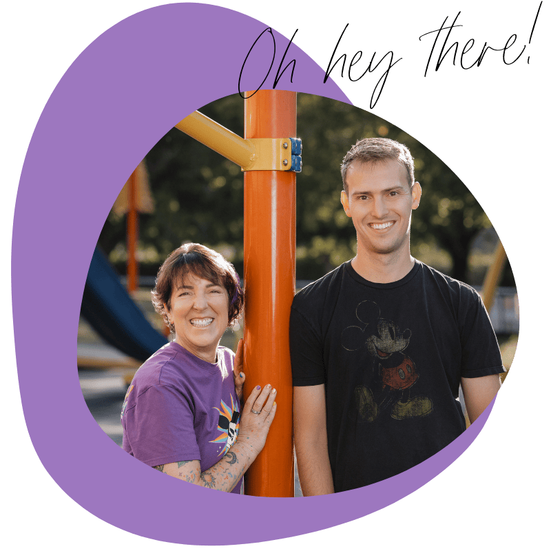 A woman and a young man smiling at a park playground, holding onto an orange pole. Meet Dr. Jaci MD and Dr. Drew MD. They are local pediatricians in Roseburg Oregon.