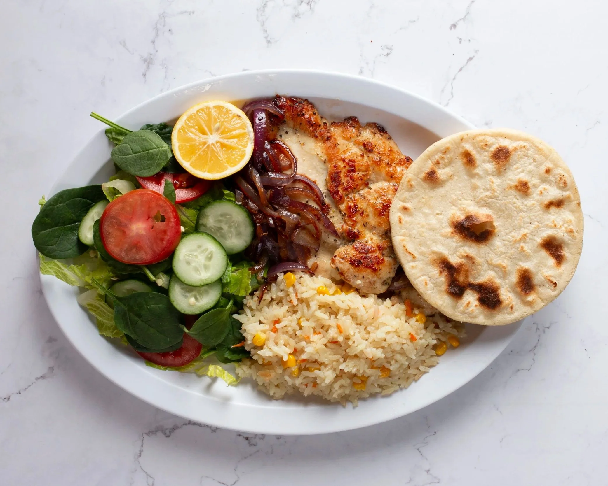 Grilled Chicken plate from Pupusas de la Reina Restaurant