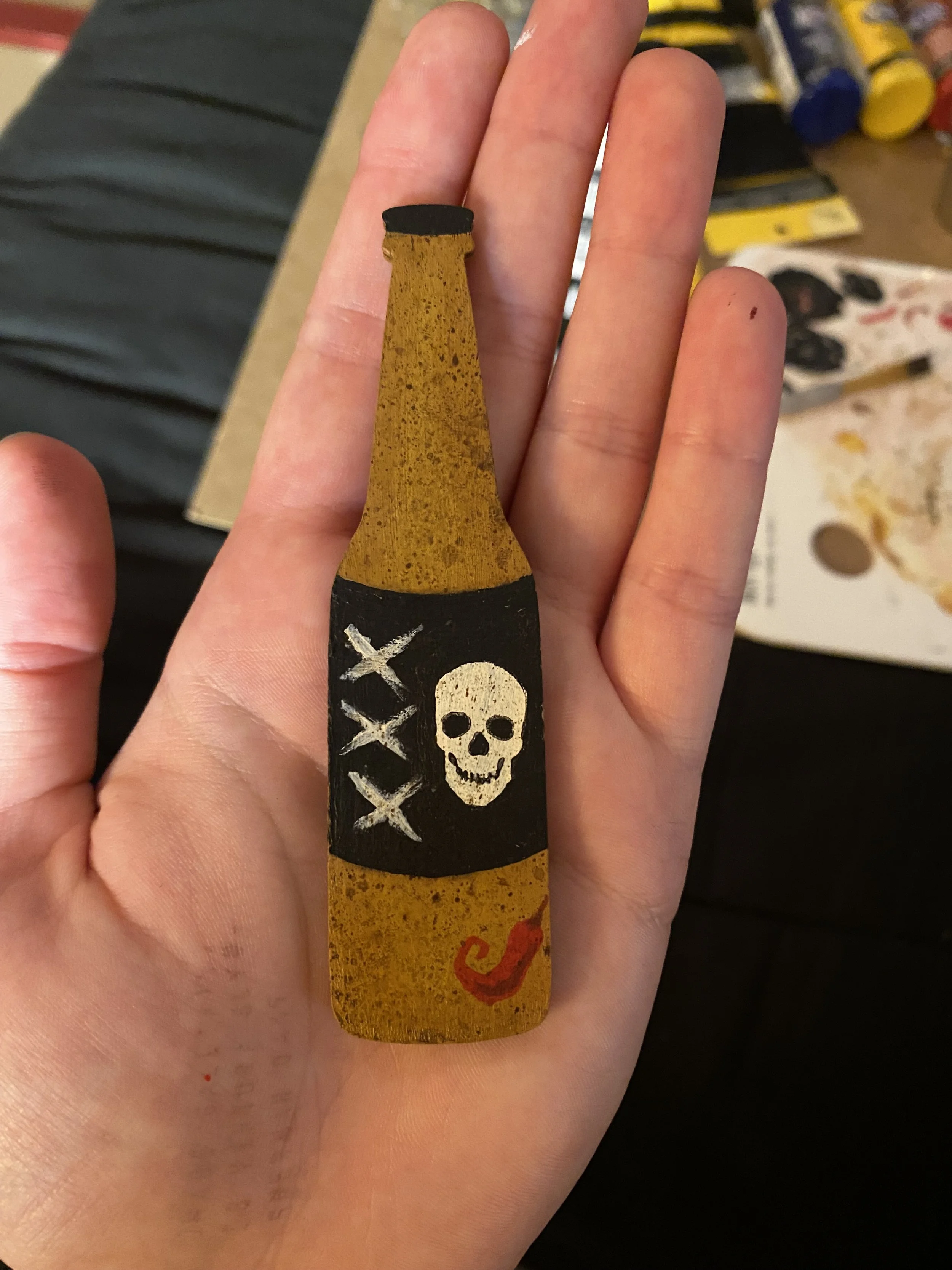 Liquor bottle hanger, finished