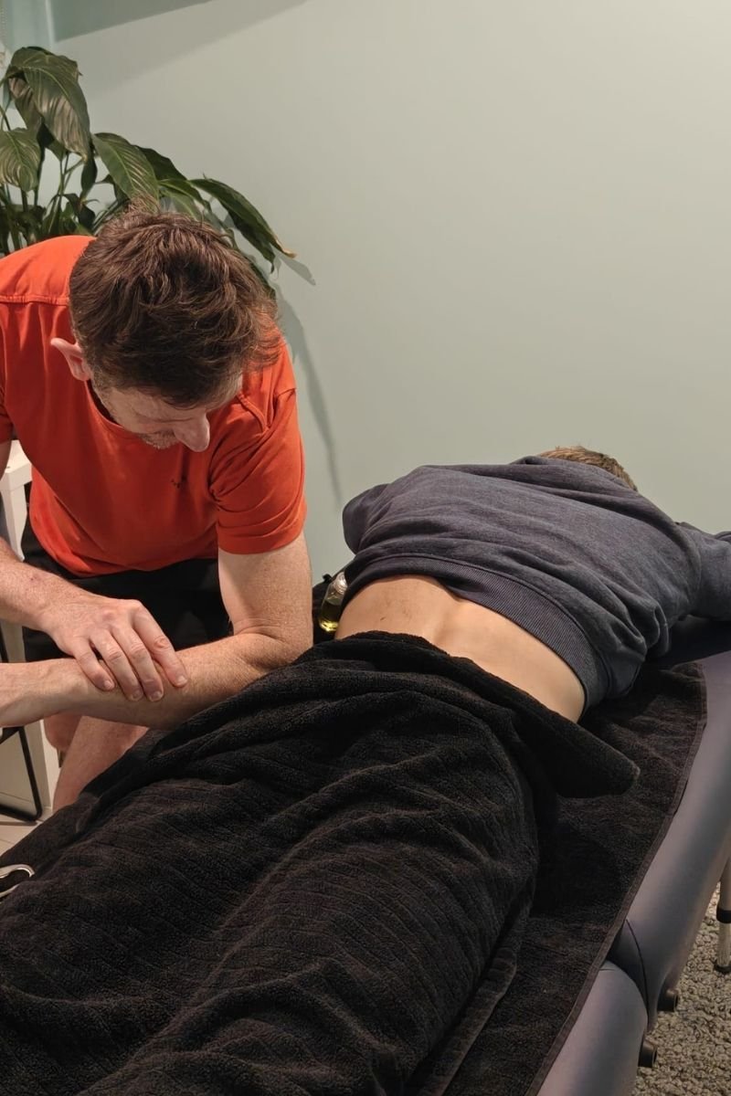 Luke massaging a client