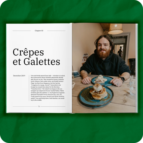 Krinkled printed family book open to chapter titled Crêpes et Galettes with family photo and narrative story