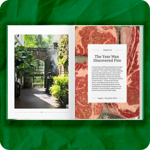 Krinkled printed family book open to chapter titled The Year Man Discovered Fire with family photos and narrative