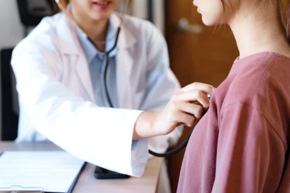 Doctor examines patient in cardiology