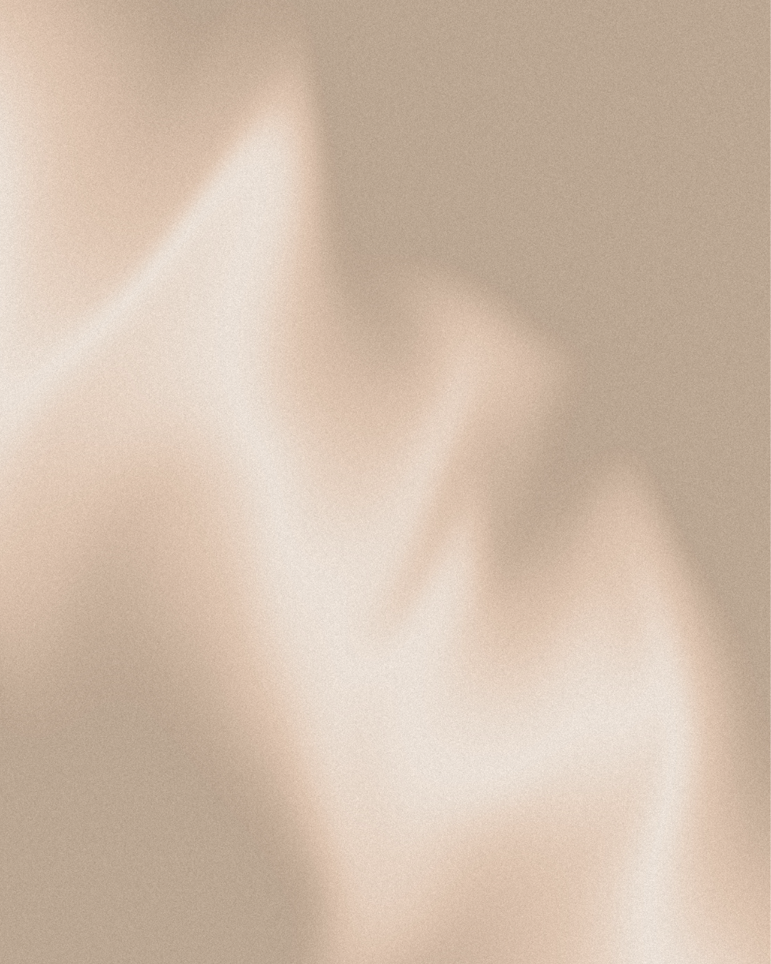 Et blødt, beige puder.