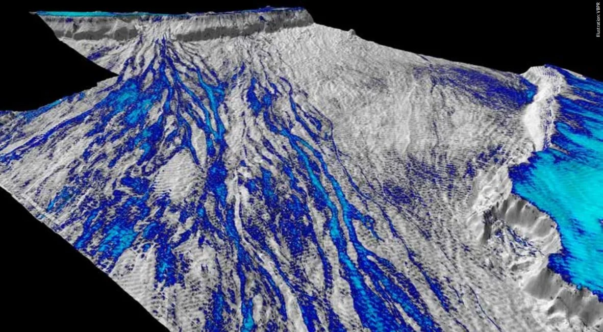 3D topographical map with terrain features and blue water flow paths from snow or ice melt, showing a glacier or snow-covered mountain area.
