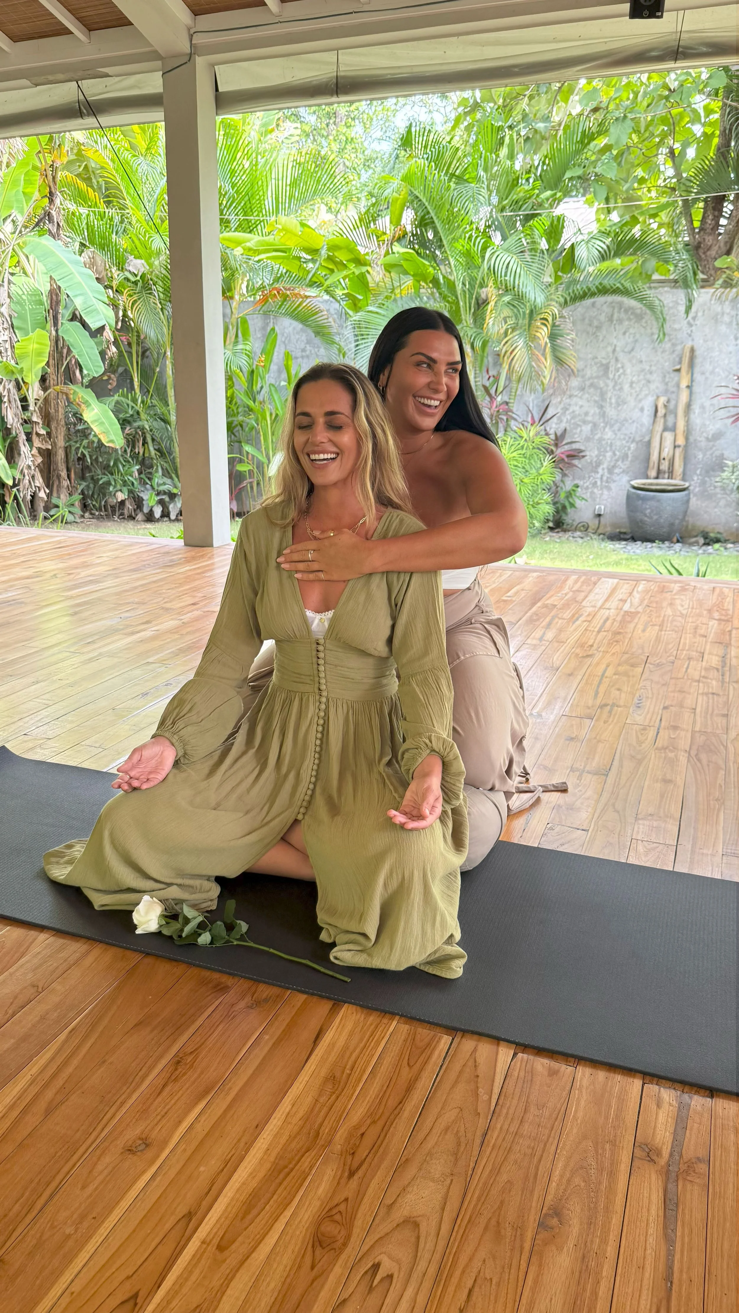 picture of jordan and costumer doing breathework