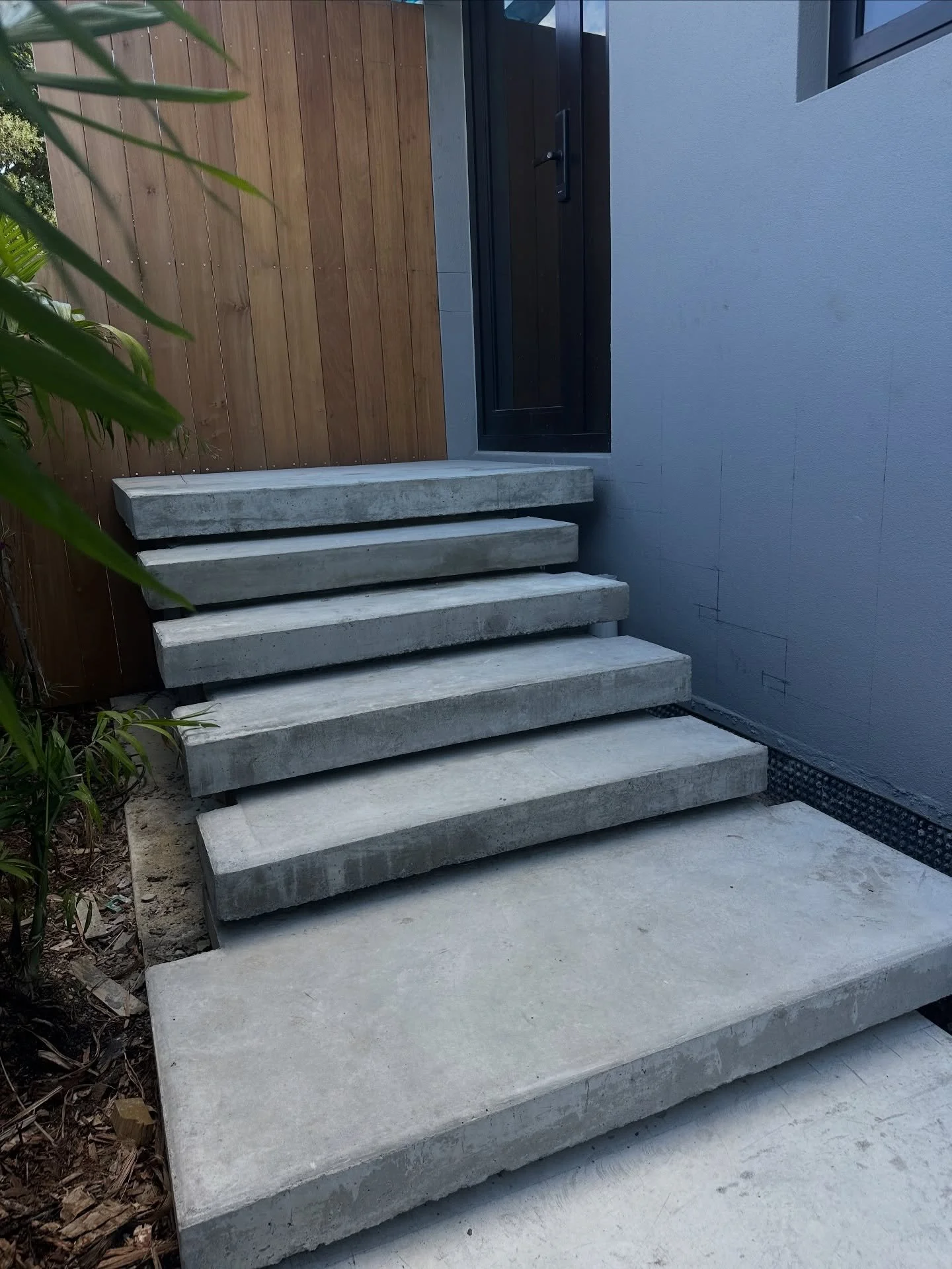 Westmere new build - floating entry stairs and landing.