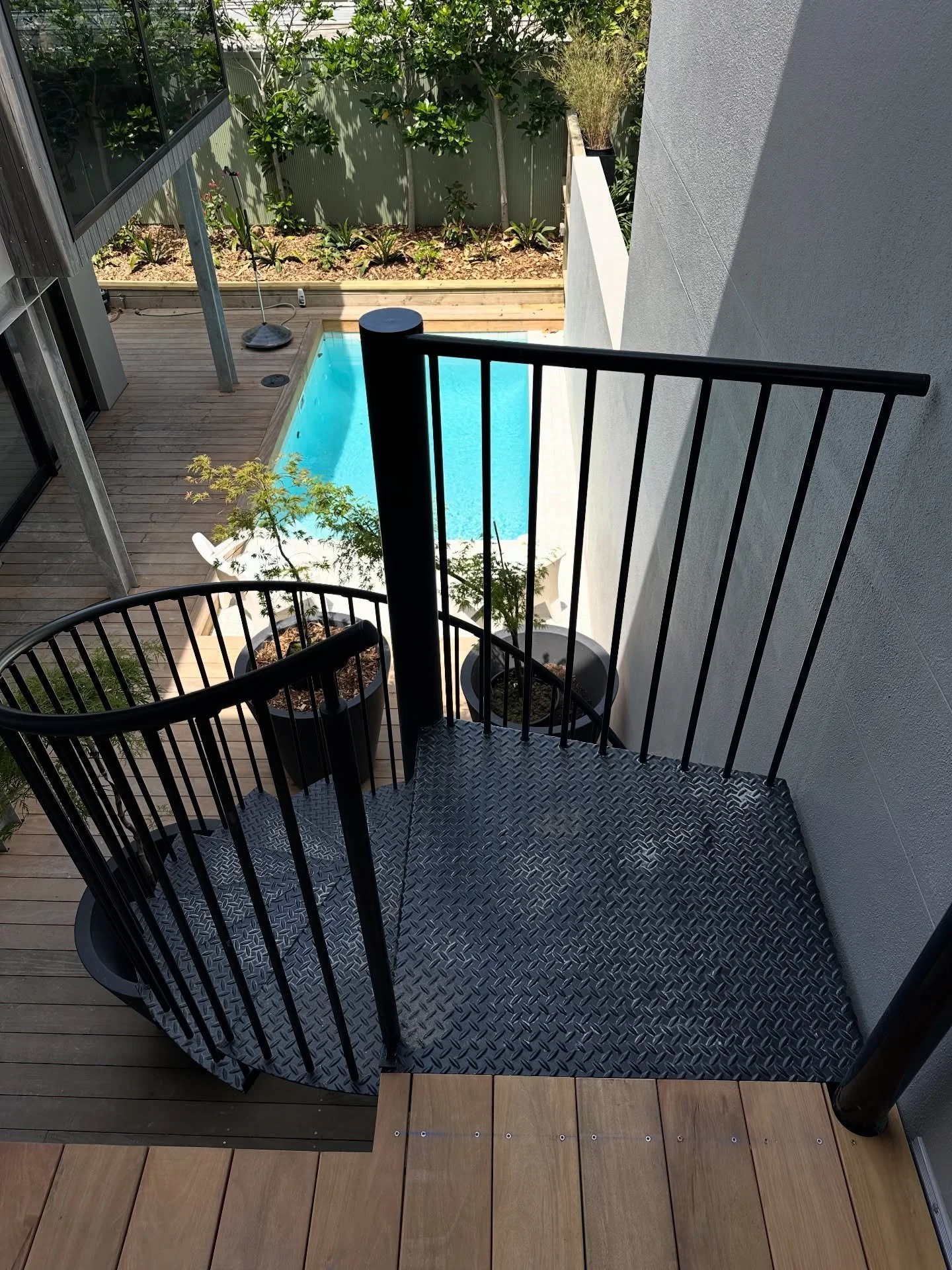 94 Old Mill: Spiral from mid floor breezeway to lower deck / pool