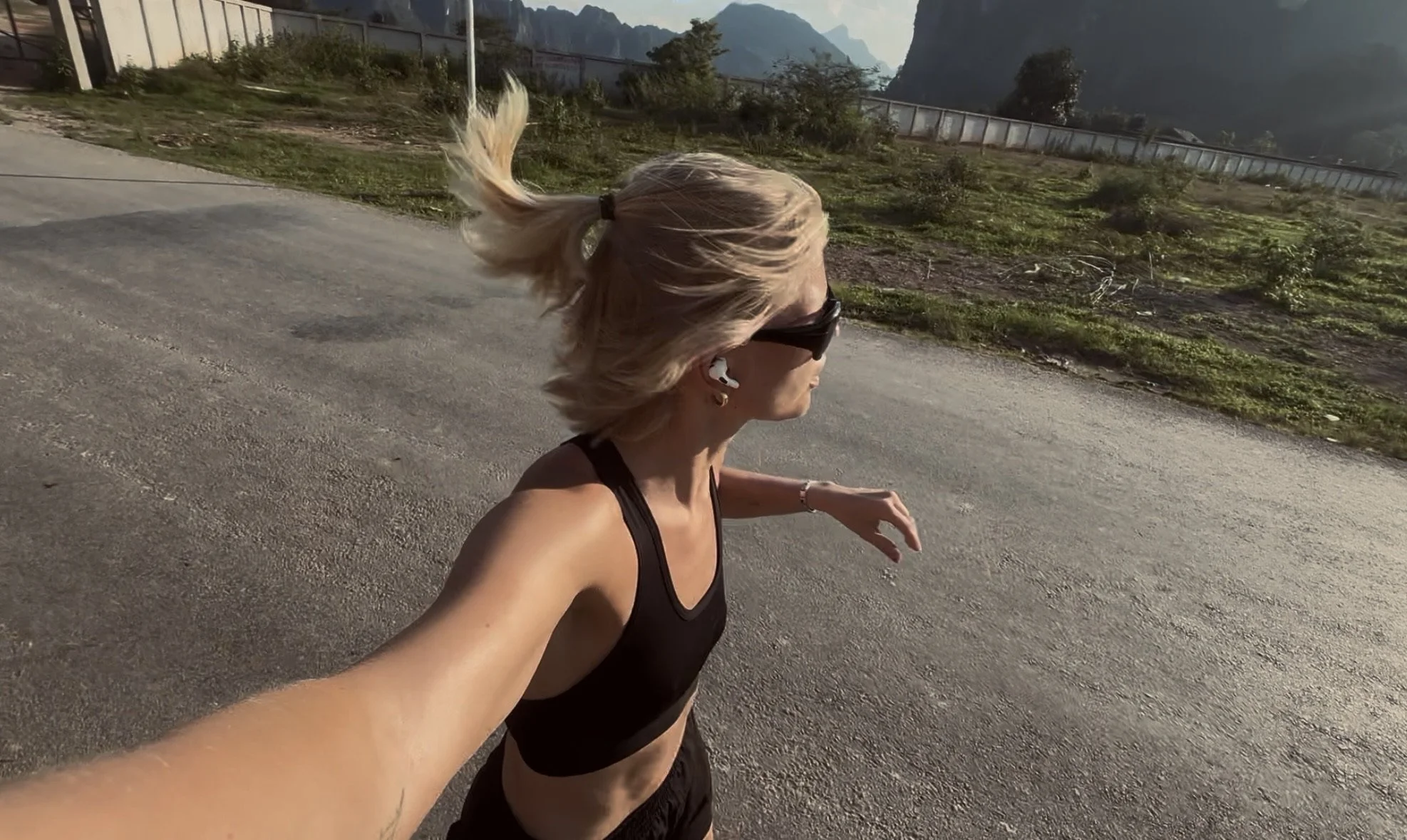 Woman running outdoors as she gets back into fitness