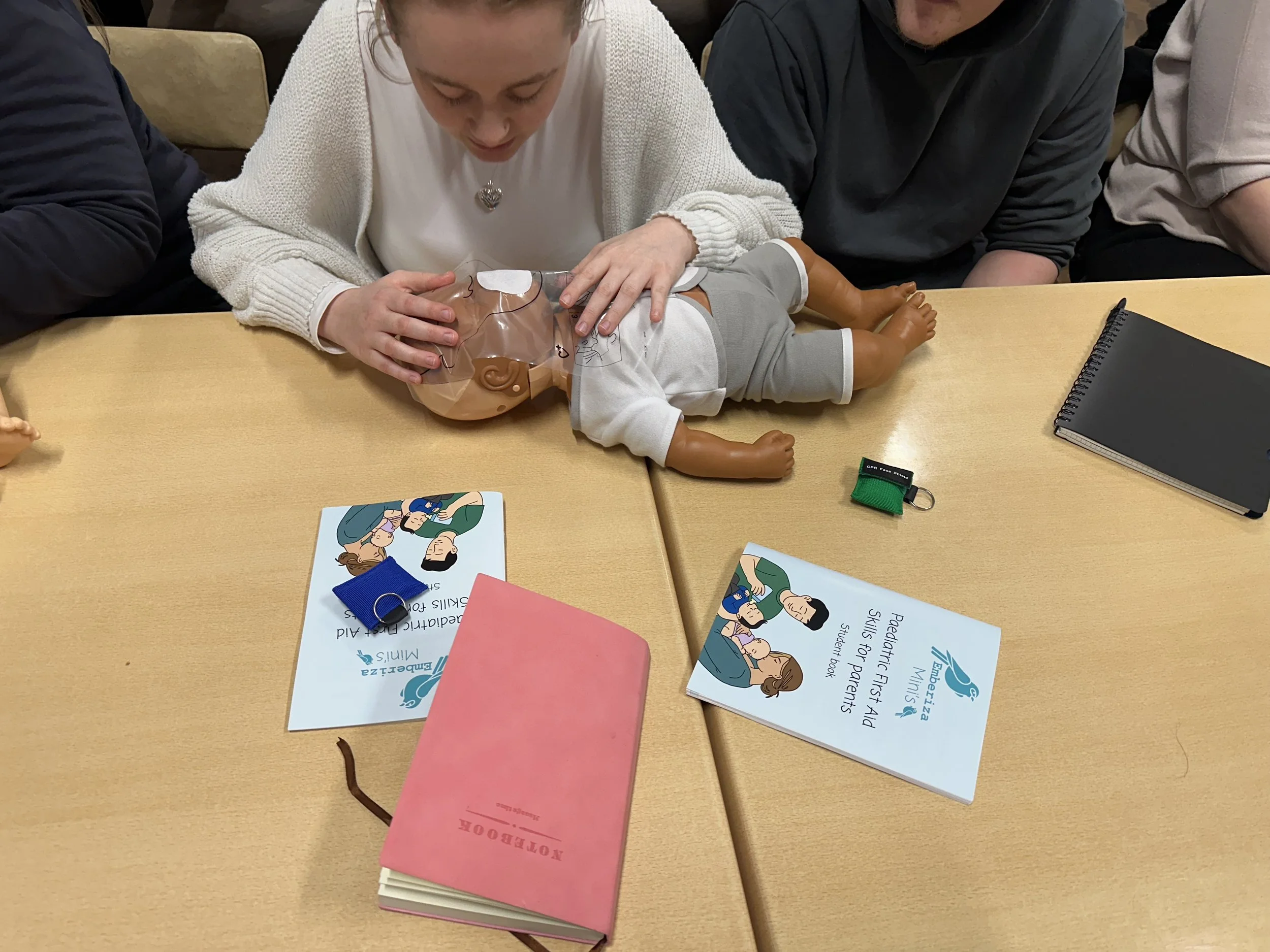 practising rescue breathes