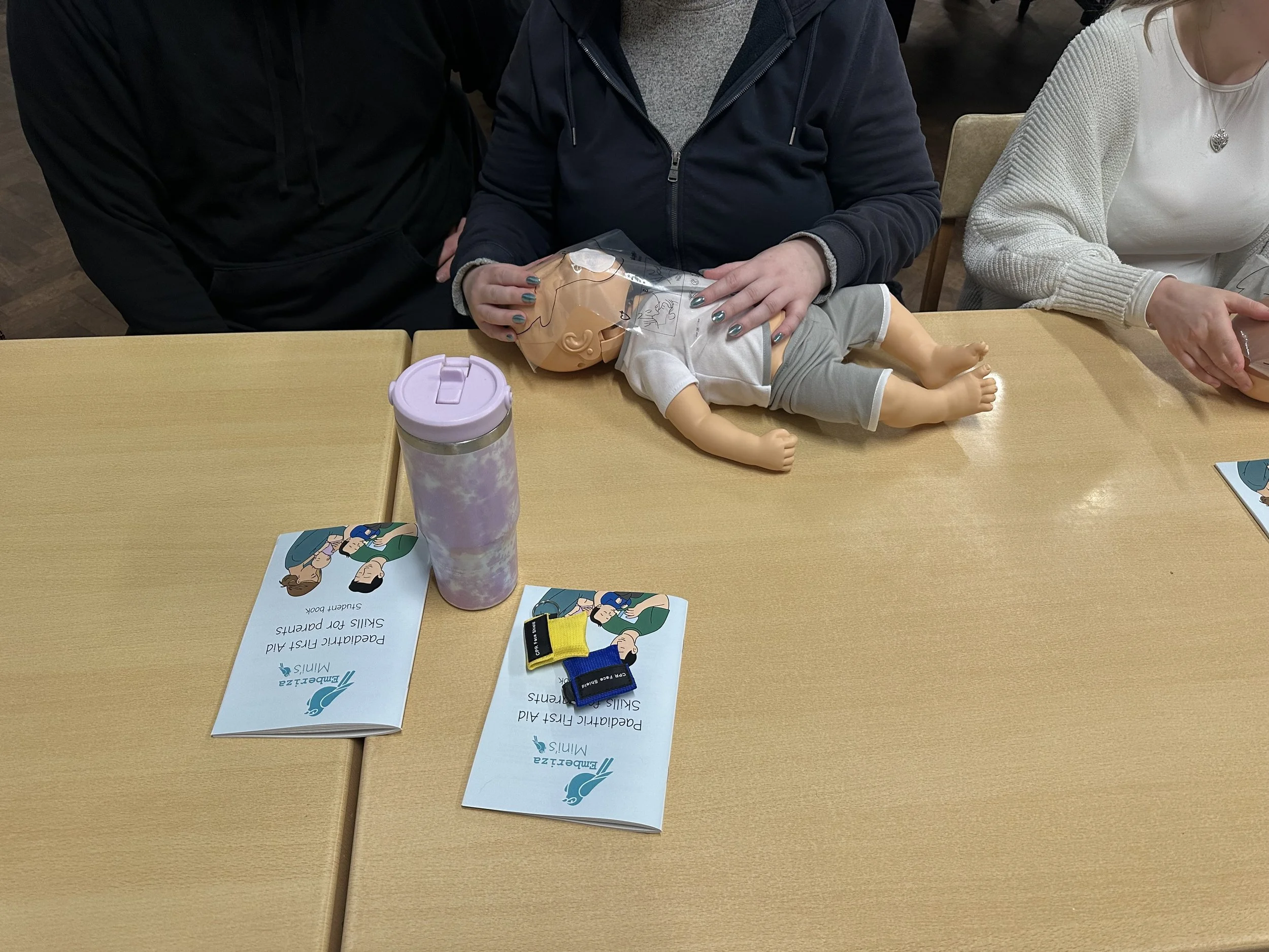 Face shields on an infant mannequin