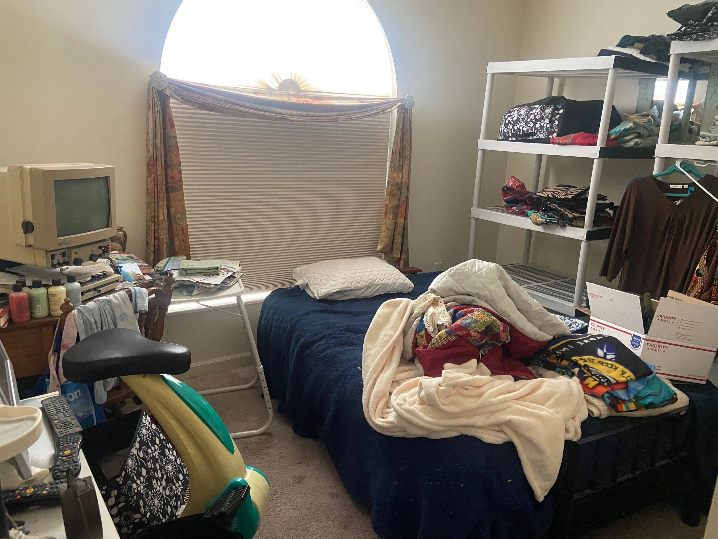 Bedroom before decluttering and staging 