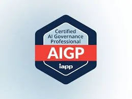 A badge with a blue hexagon shape, red banner reading "AIGP," and text indicating certification as an AI Governance Professional by IAPP.
