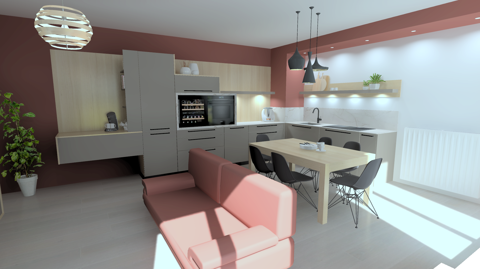 Cuisine moderne avec meubles gris clair, murs bordeaux et blancs, avec une table en bois, des chaises noires, une lampe suspendue noire, des étagères avec des plantes et des accessoires, et un canapé rose clair devant la cuisine.