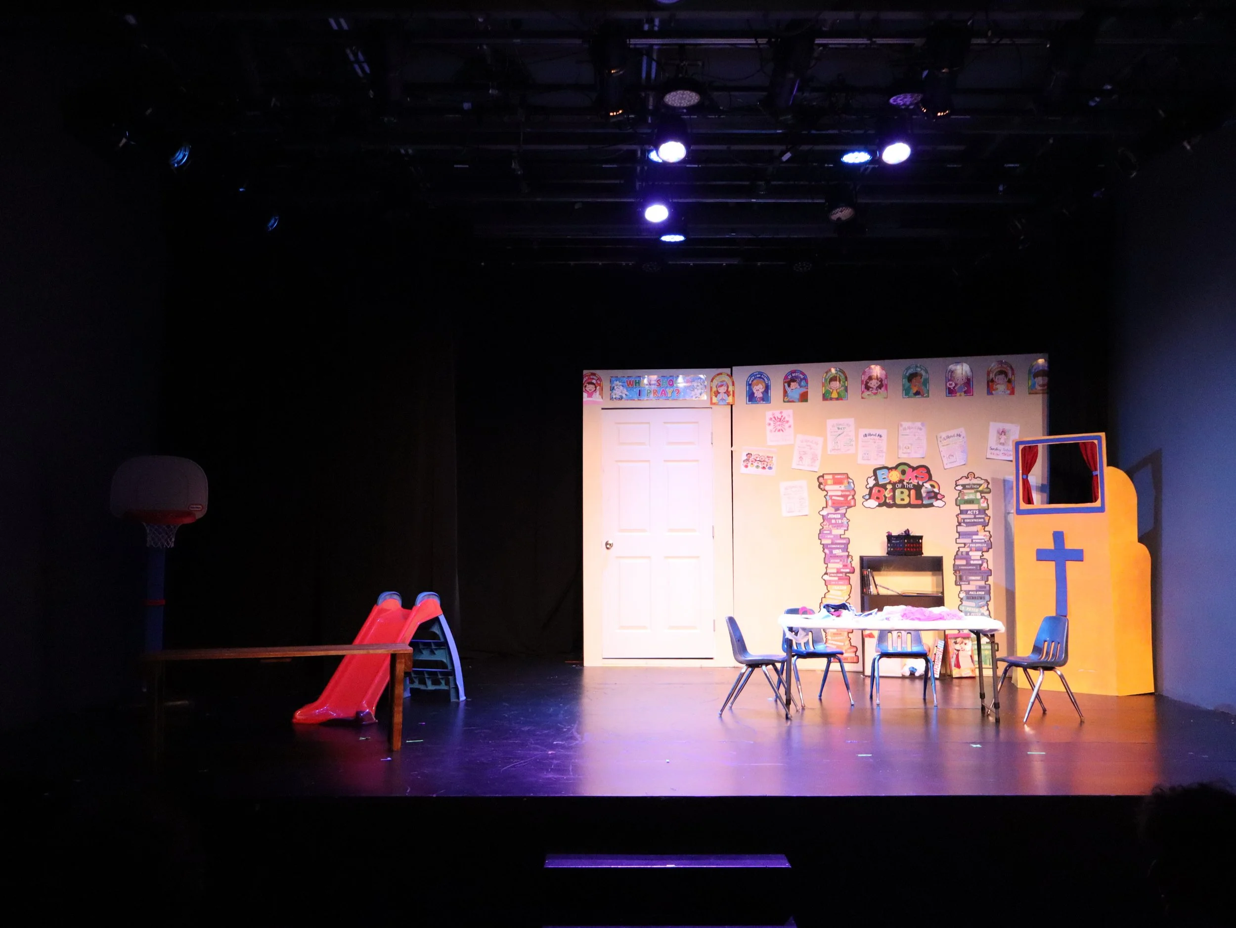 Pre-Show // Stage right is exterior playground // Stage left is interior church classroom