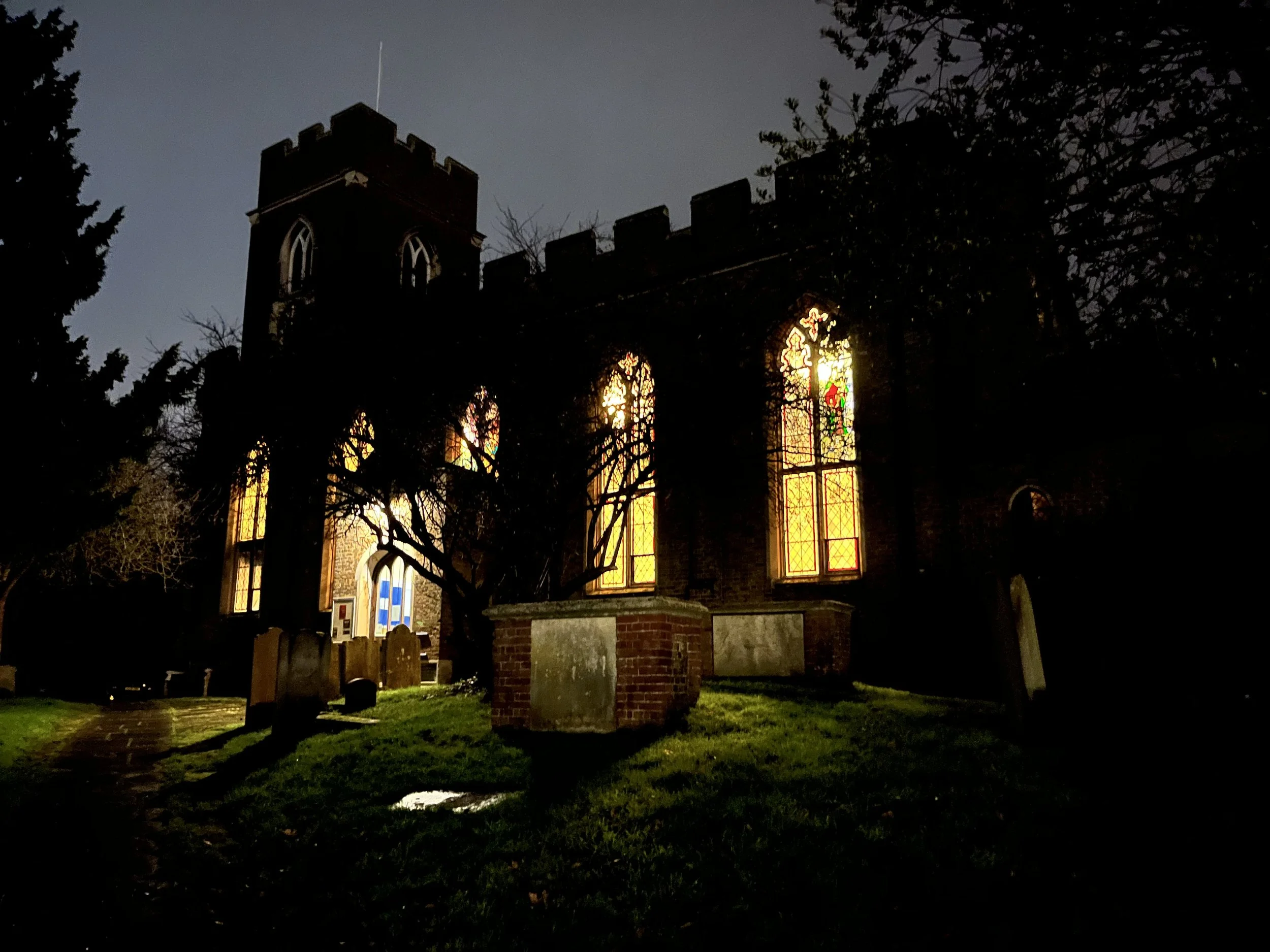 St Mary's lit at night with glowing windows