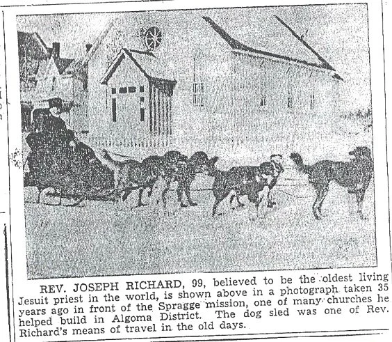 Rev. Joseph Richard on his dog sled