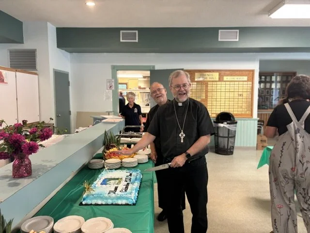 c.2026 Bishop Thomas Dowd and Fr. Ron Ambeault prepare to cut the 120th Anniversary Cake at the reception.