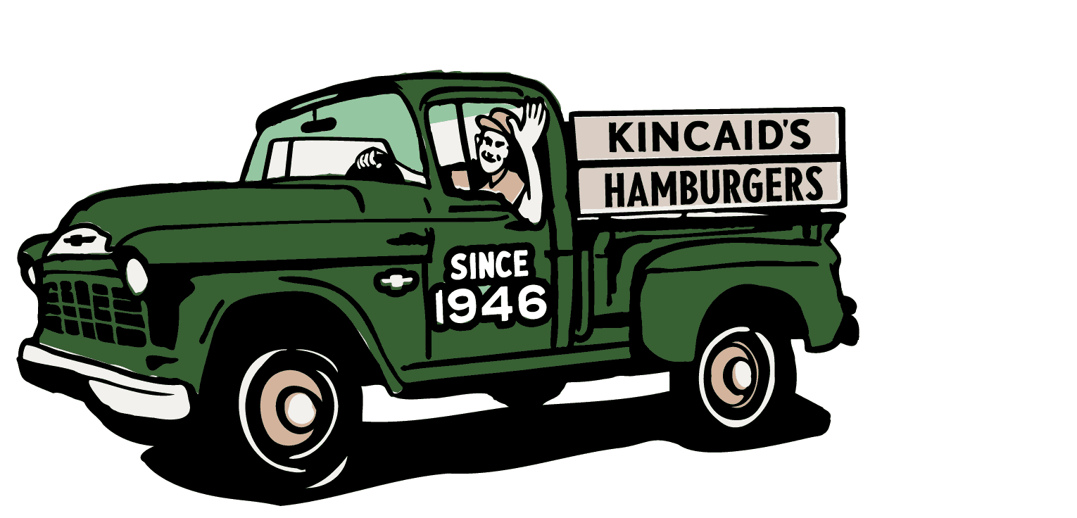 A vintage green pickup truck with a sign on the side reading "Kincaid's Hamburgers" and "Since 1946." The truck has a smiling man waving from the driver’s seat.