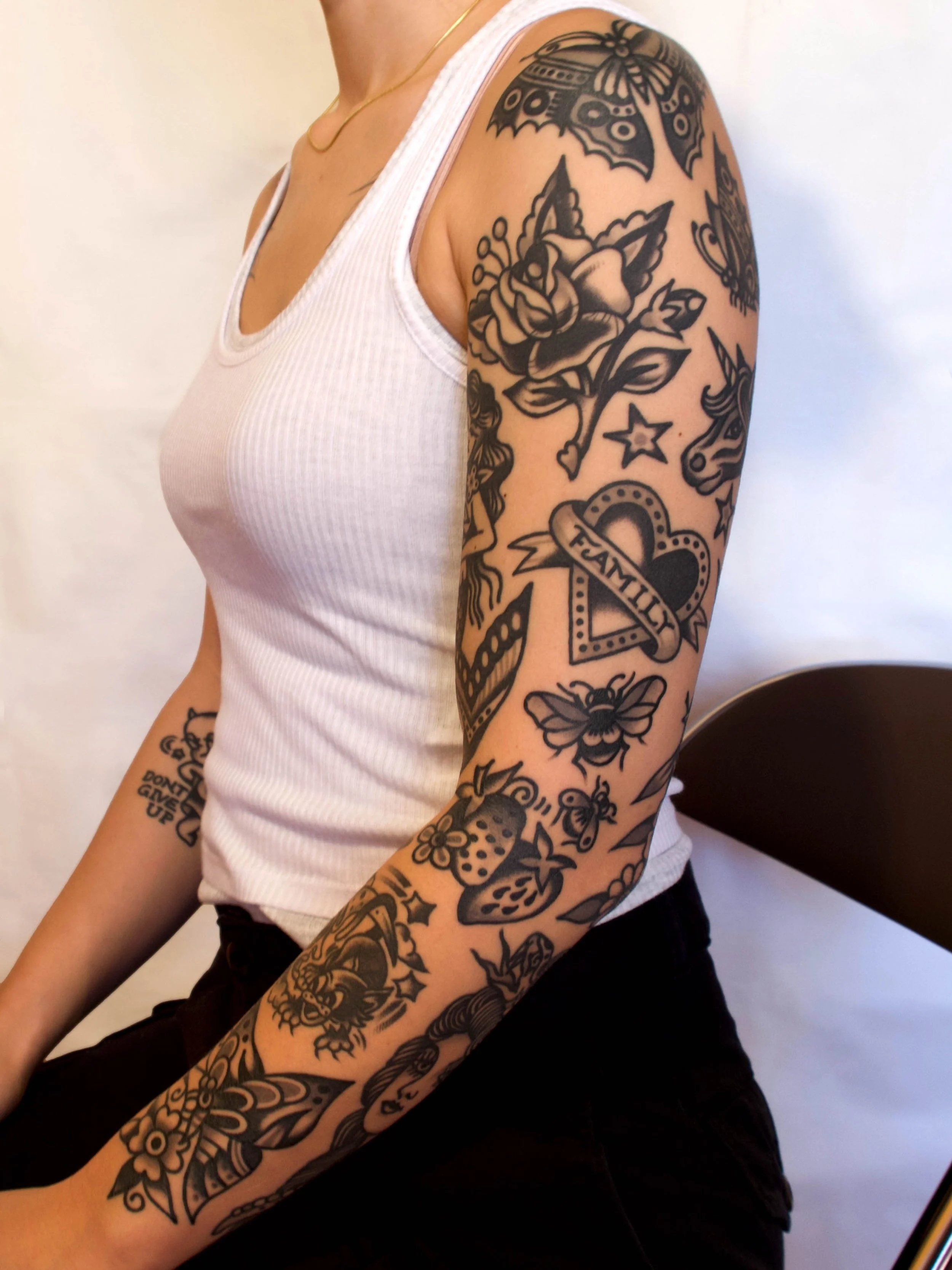full-sleeve-black-and-gray-rose-strawberry-butterfly-heart-bumblebee-traditional-oldschool-tokyo-tattoo-electric-martina.jpg
