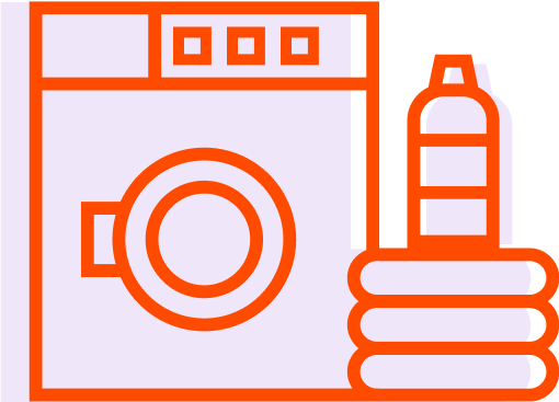 A washing machine and a bottle of detergent or fabric softener beside it.