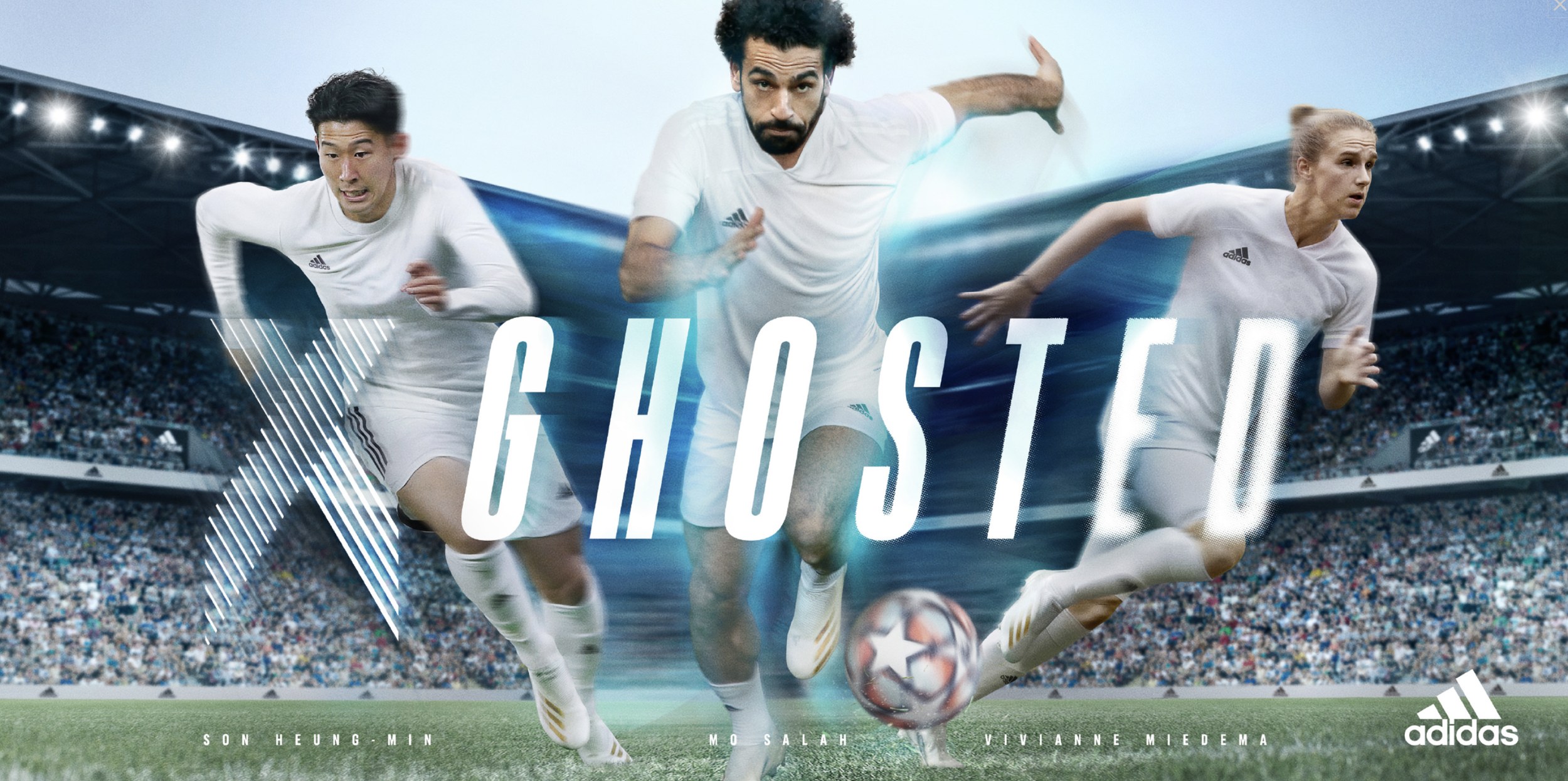 Three soccer players running on the field in a stadium, with the text "GHOSTED" overlayed and the Adidas logo at the bottom right.