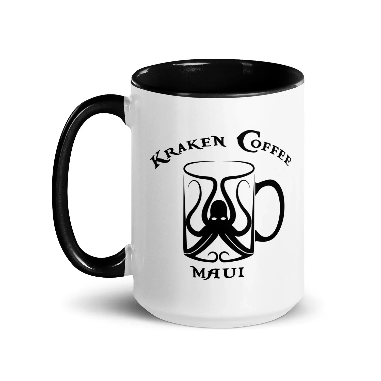 White ceramic coffee mug with black handle and interior, featuring a design of an octopus inside a coffee mug and the text 'Kraken Coffee Maui'.