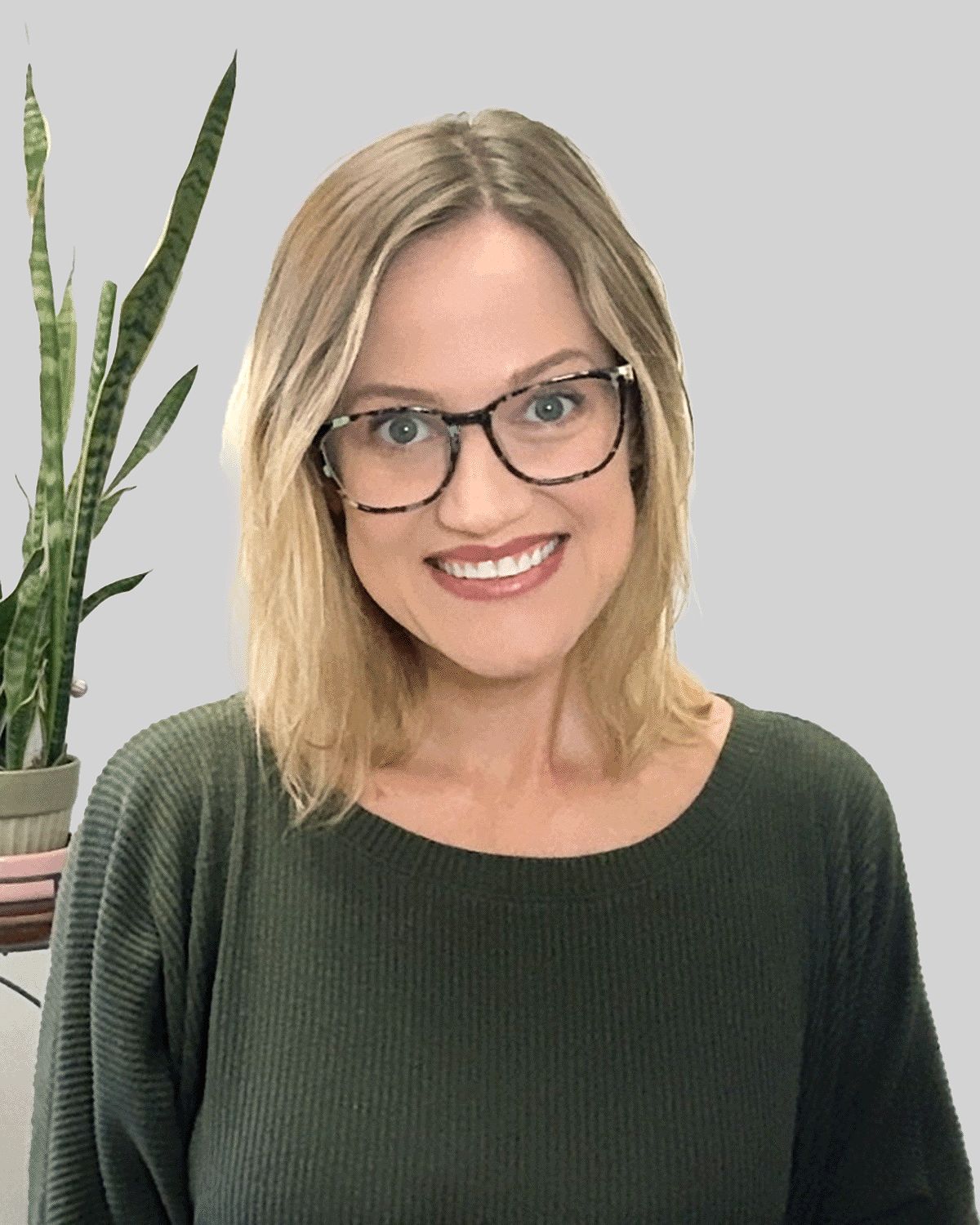 Ellison's face, with plant