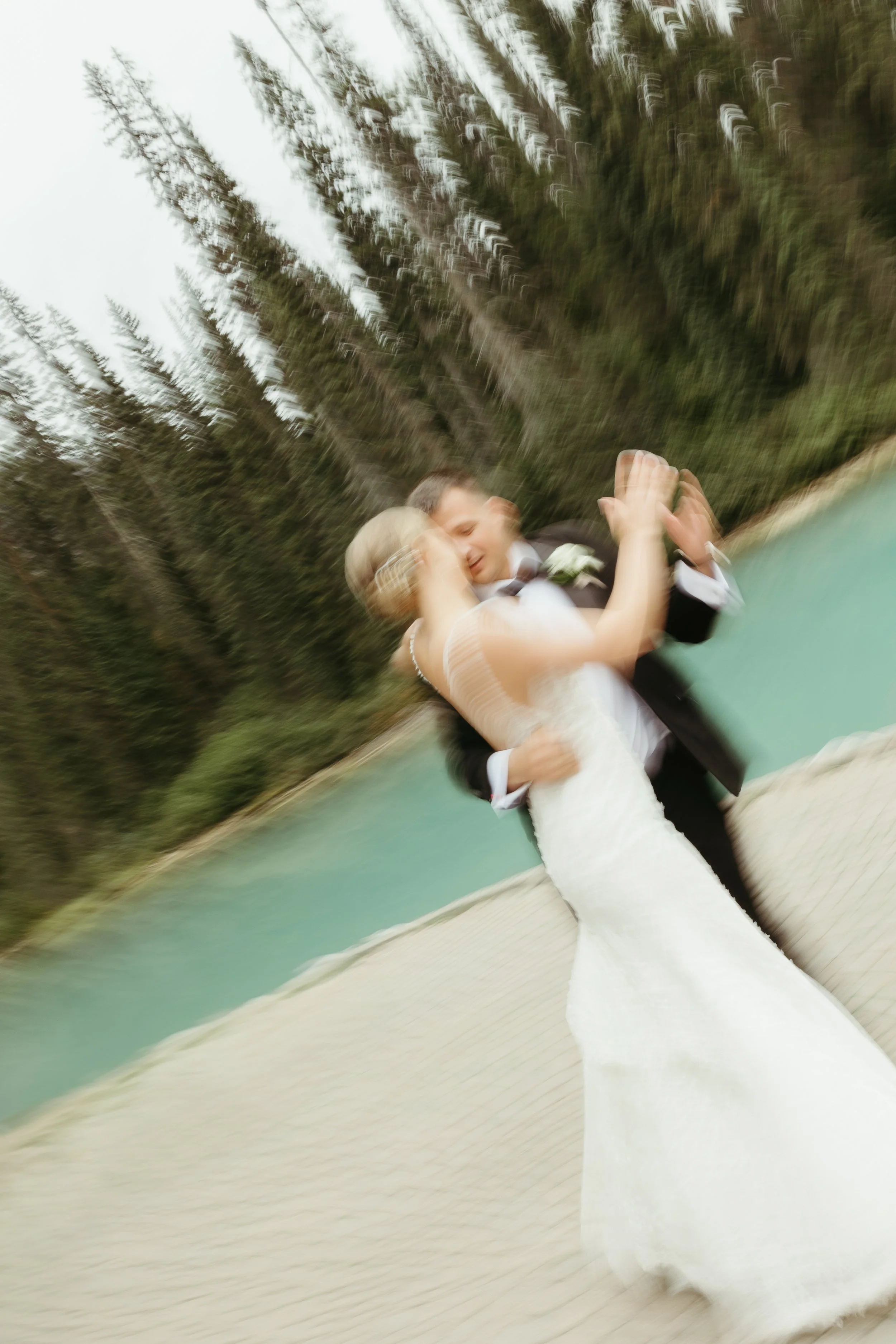 Artistic blurry photo of bride and groom dancing at their wedding at Emerald Lake Lodge