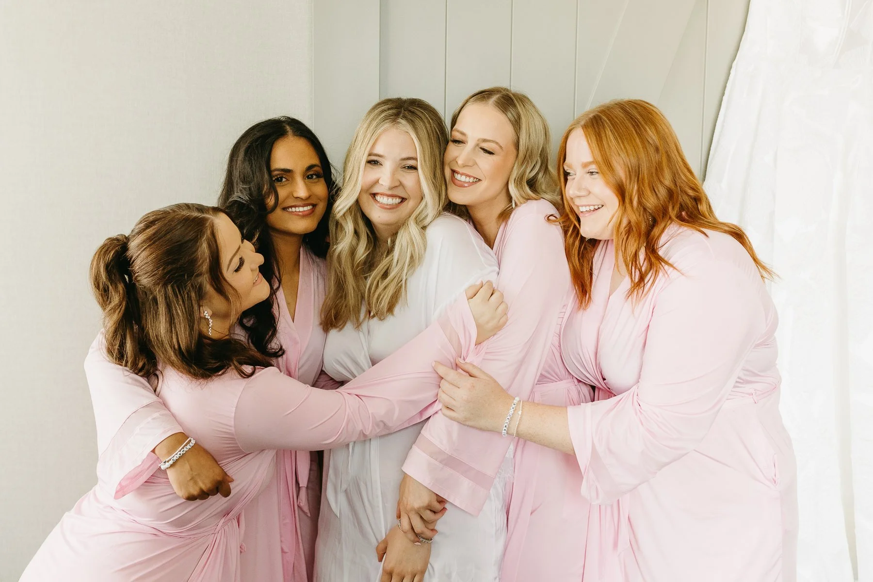 Candid bridesmaid getting photos