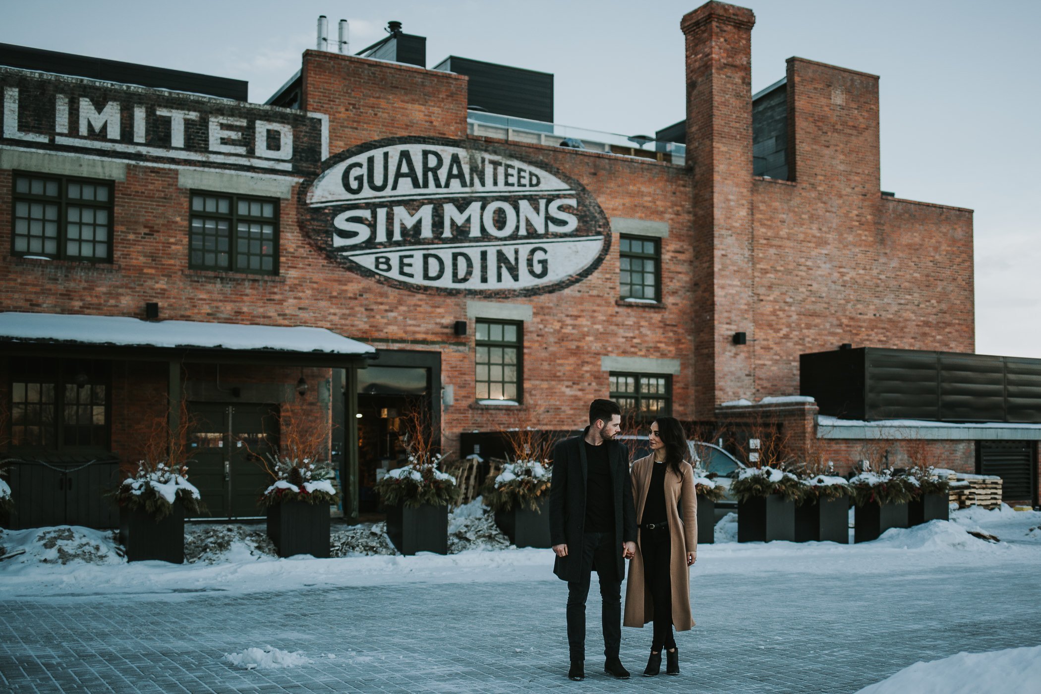 Calgary engagement session in front of the Simons Building 