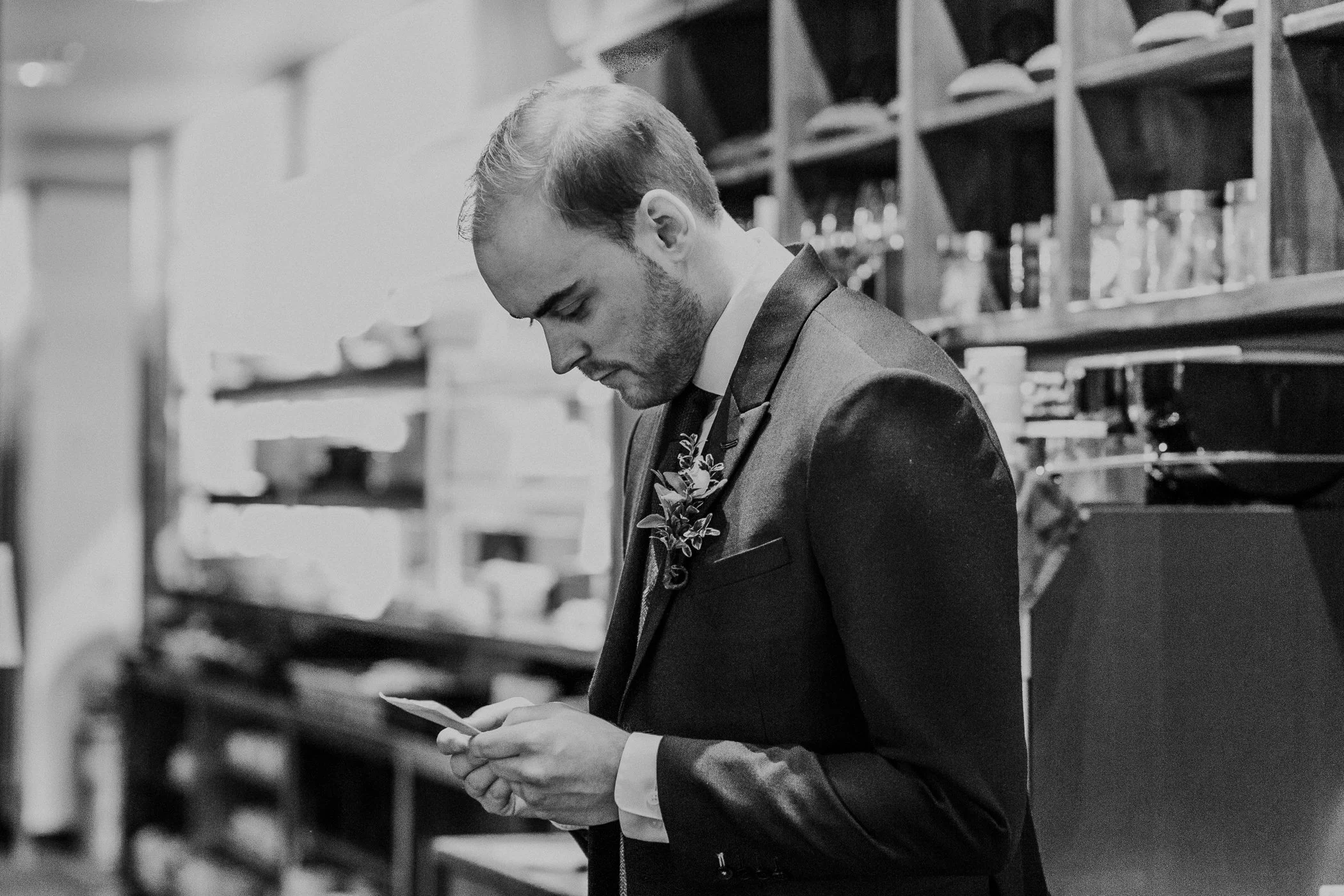 Groom reading his vows at Calgary Alberta winter wedding