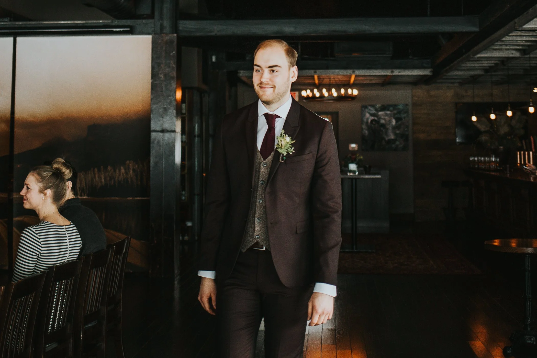 Groom walking down the aisle at Calgary Alberta The Lake House wedding