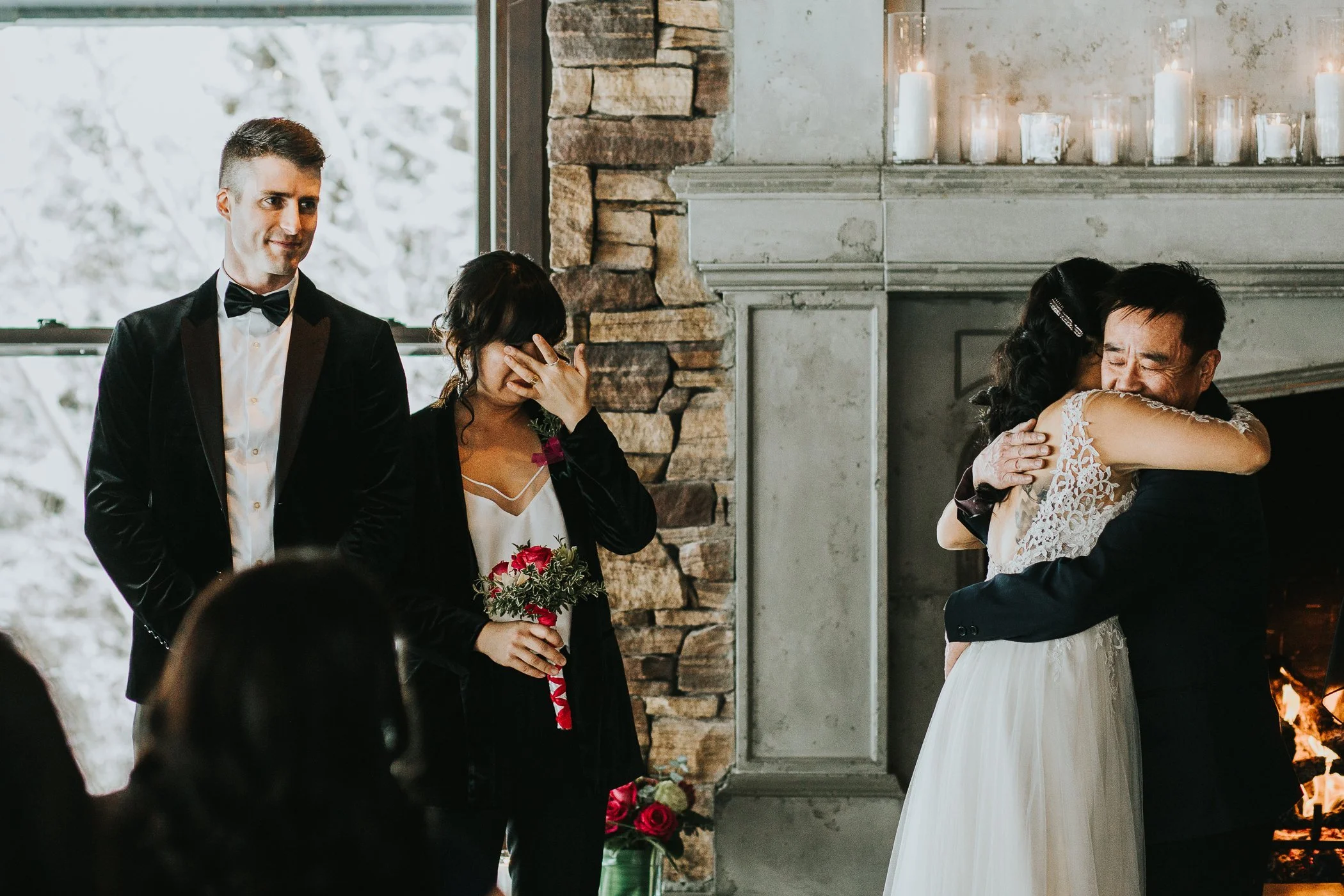 Bride hugging father at Calgary Alberta The Lake House wedding