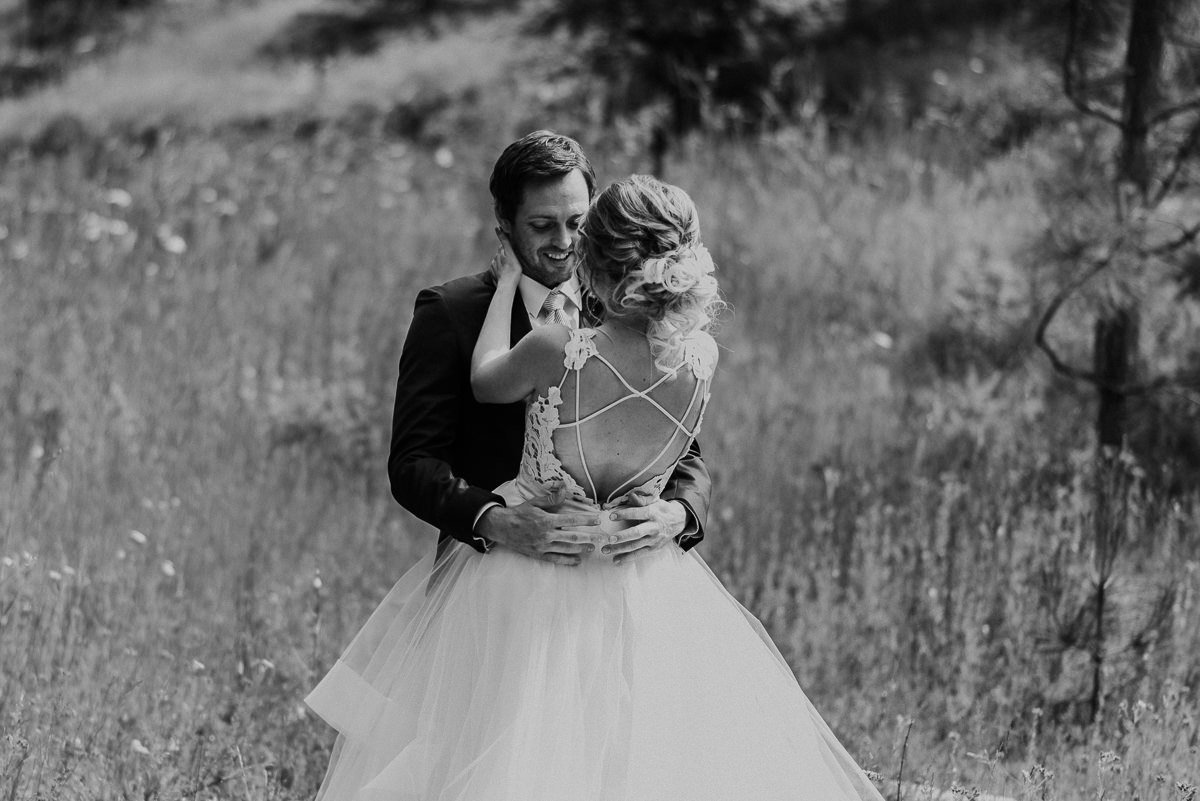 Bride and groom black and white emotional first look 