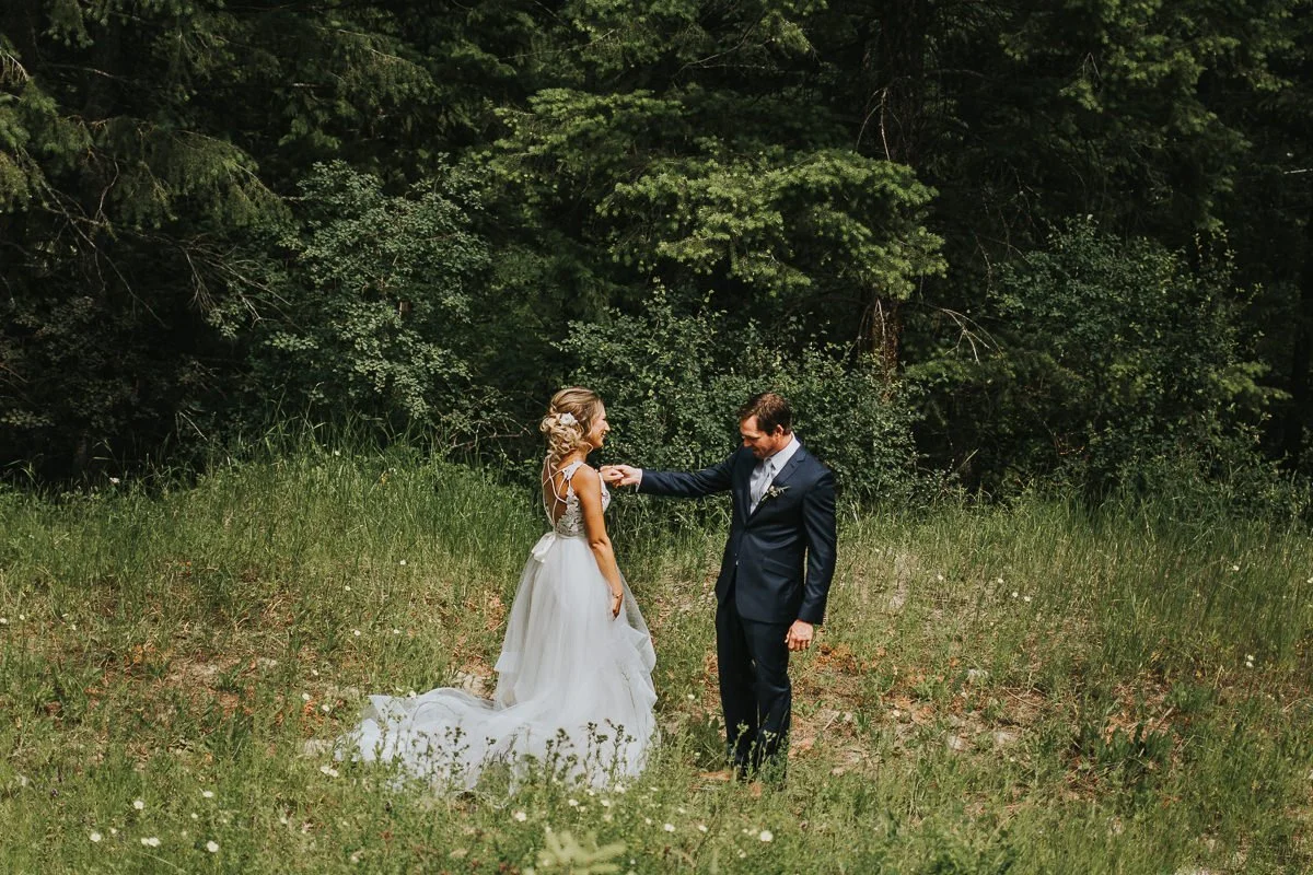 Bride and groom first look meadow ranch wedding