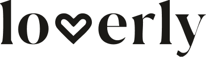 Close-up of the word 'lovelry' with a heart symbol replacing the 'v', on a dark background.