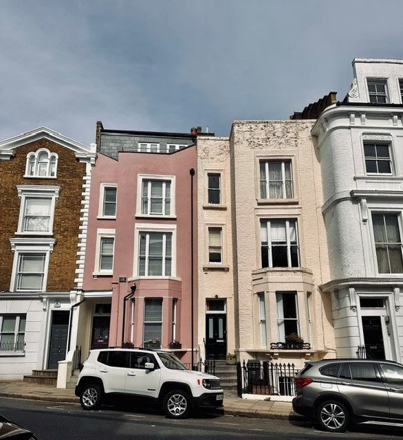 Row of London townhouses — residential properties under professional block managemen