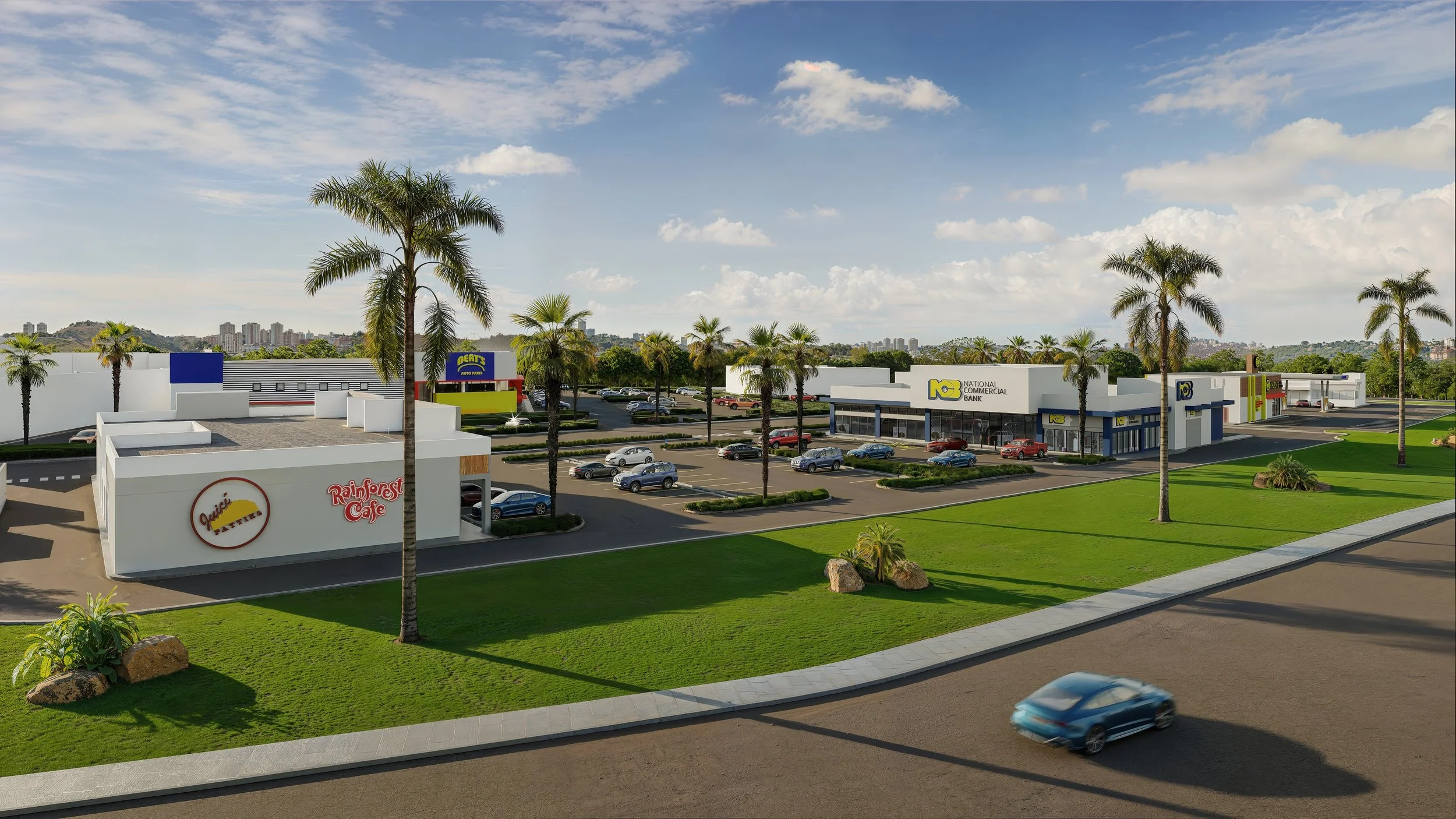 View of a modern shopping center with parking lot, multiple stores including 'Yard Bird',
