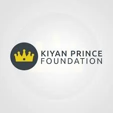 Logo for Kiyan Prince Foundation featuring a black circle with a yellow crown and the organization name in black text.