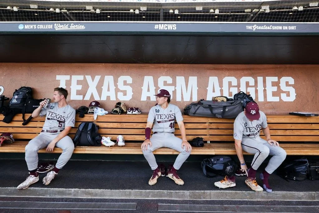 Hank Bard in the Texas A&M dugout at the 2024 College World Series in Omaha