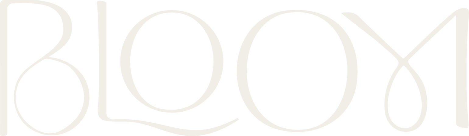 The word "BLOOM" written in large, light-colored, decorative script on a white background.