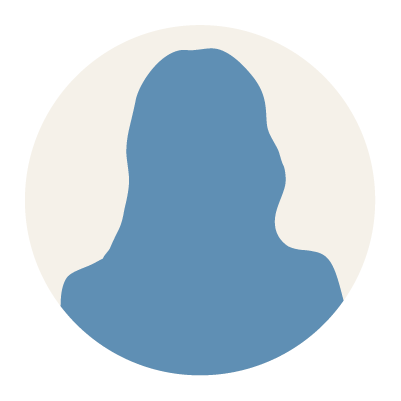 Silhouette of a person with long hair in a circular background