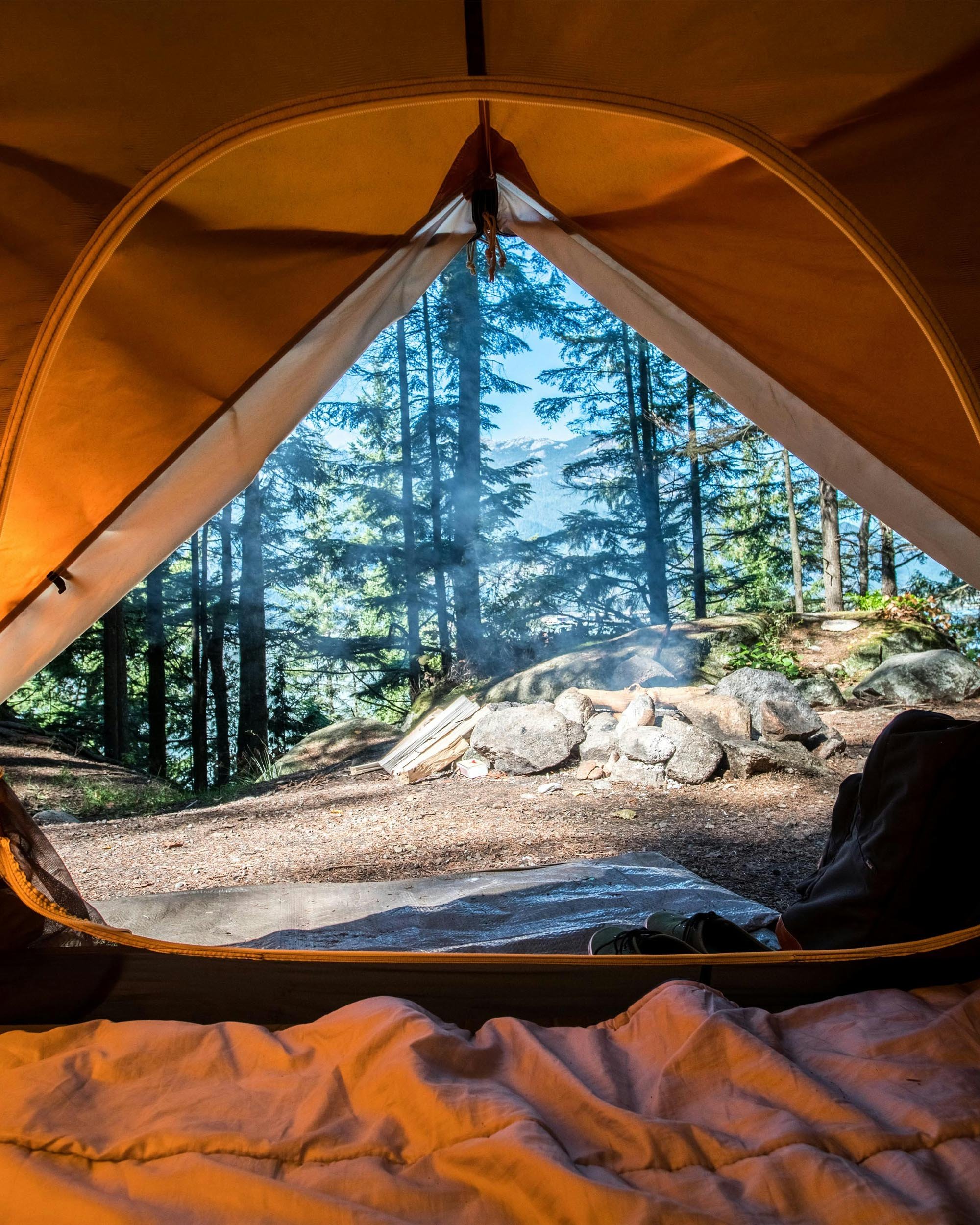 View of campground through open tent window