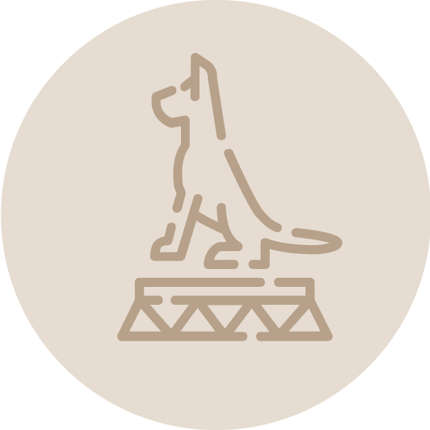 Line drawing of a dog sitting on a platform.