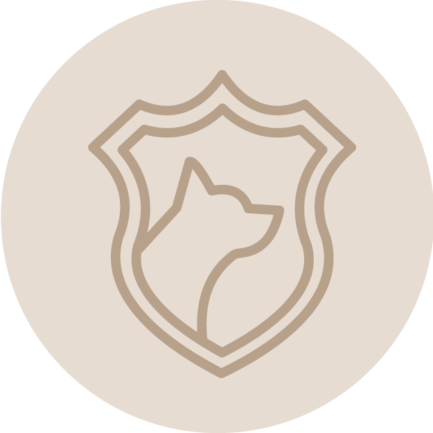 A line drawing of a dog's profile inside a shield emblem on a beige background.