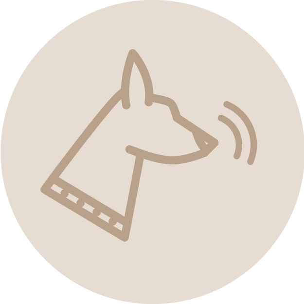 Icon of a dog barking or making a noise, depicted in a simple line drawing within a circle.