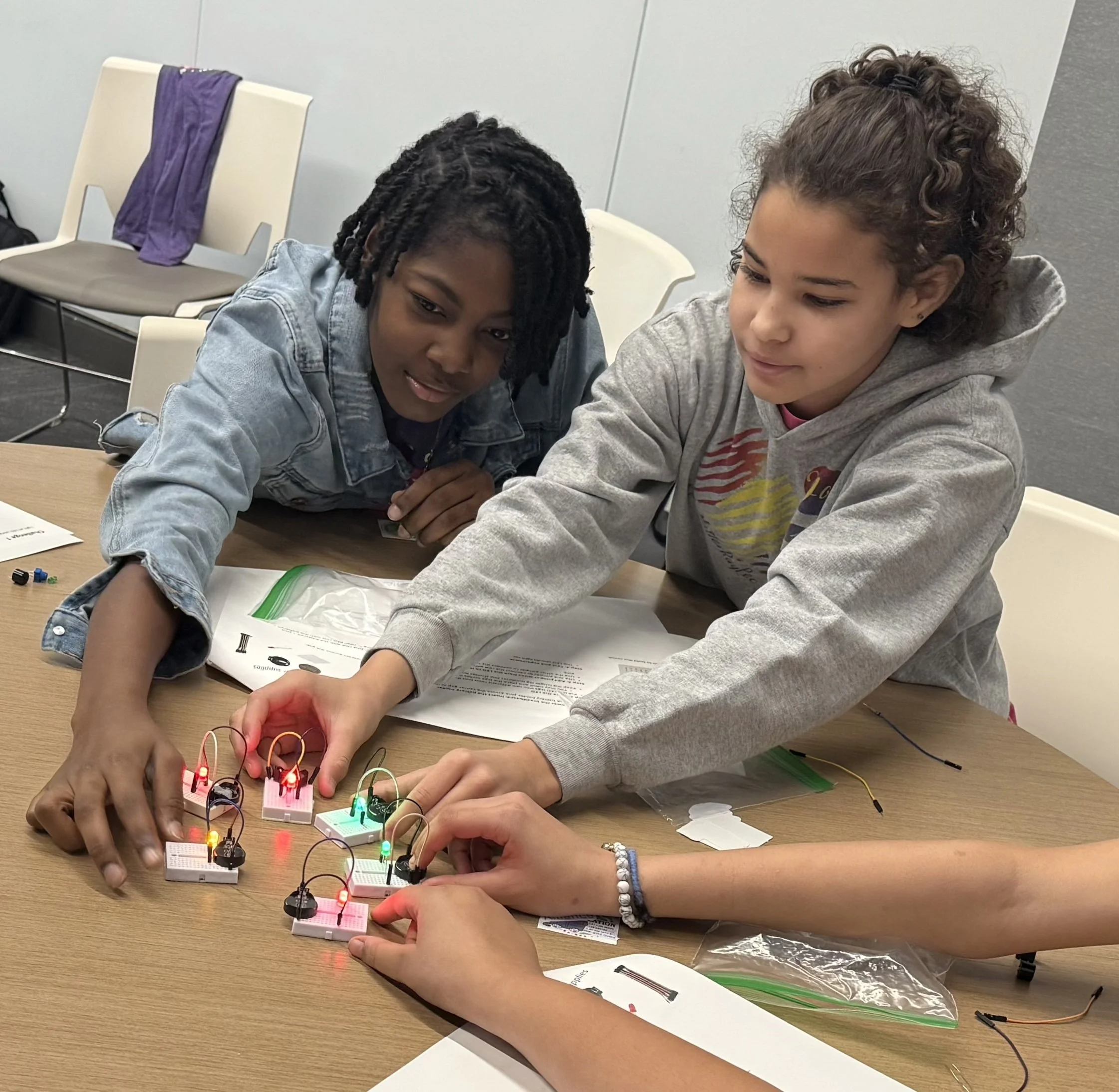 Collaborating to complete the circuit challenge, students pushed their thinking and supported one another as they worked through each step.